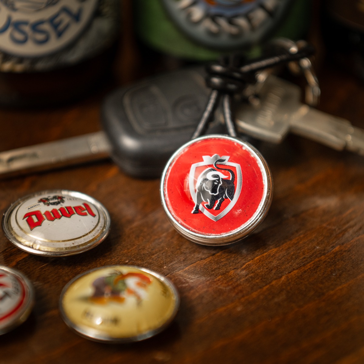 Duvel sleutelhanger met verwisselbare drukknop 1 Duvel sleutelhanger met verwisselbare drukknop